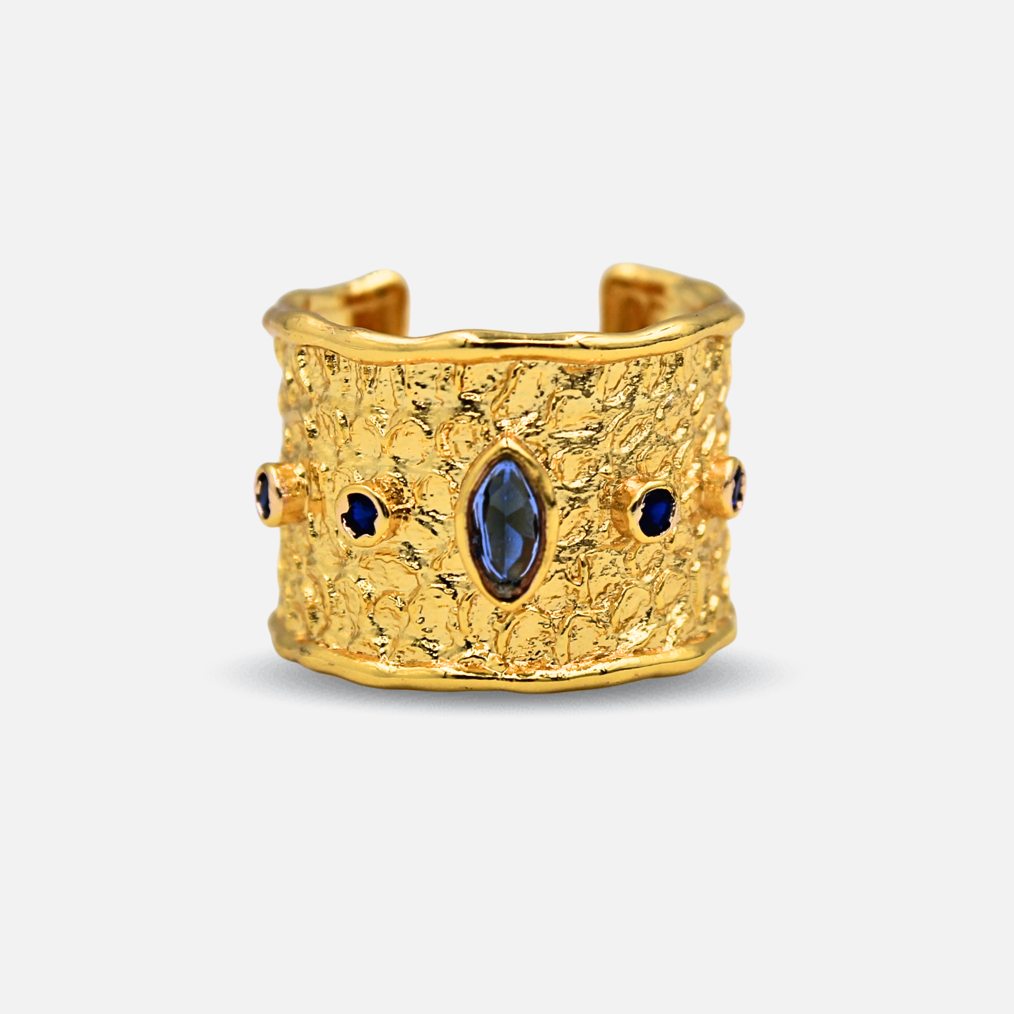 Anillo Neptuno - anillo ancho dorado con piedras azules