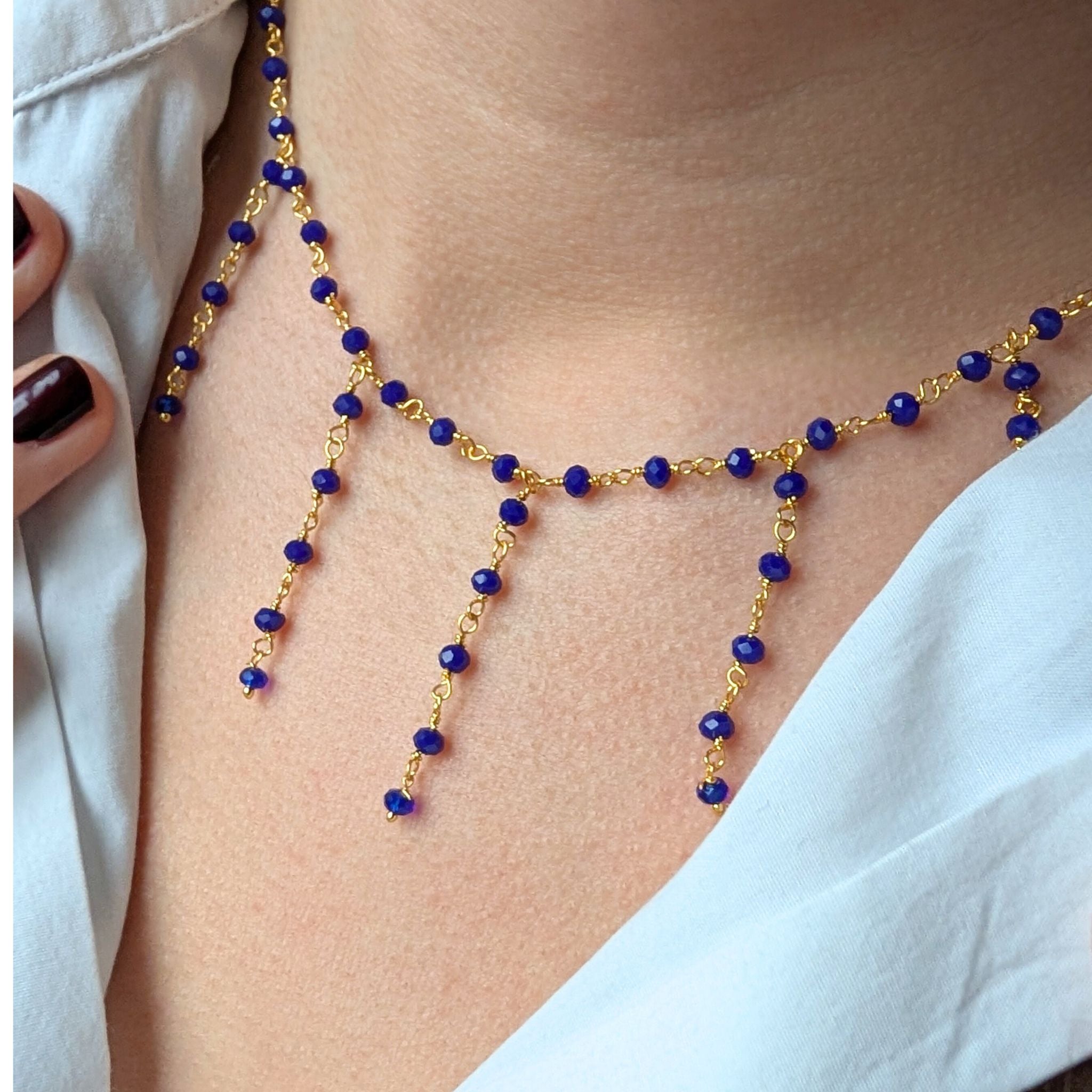 Collar Estelar - cadena fina dorada con piedras azul noche